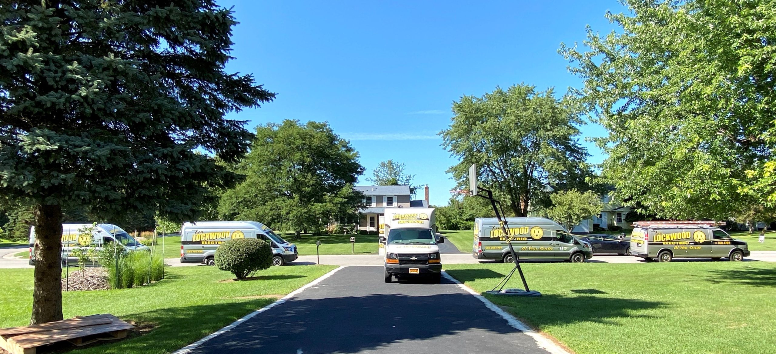 Lon Lockwood trucks lined up on residential street