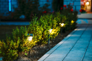 Outdoor pathway illuminated by solar-powered lights