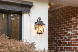 Vintage Iron Lantern Mounted on the Exterior Wall of House